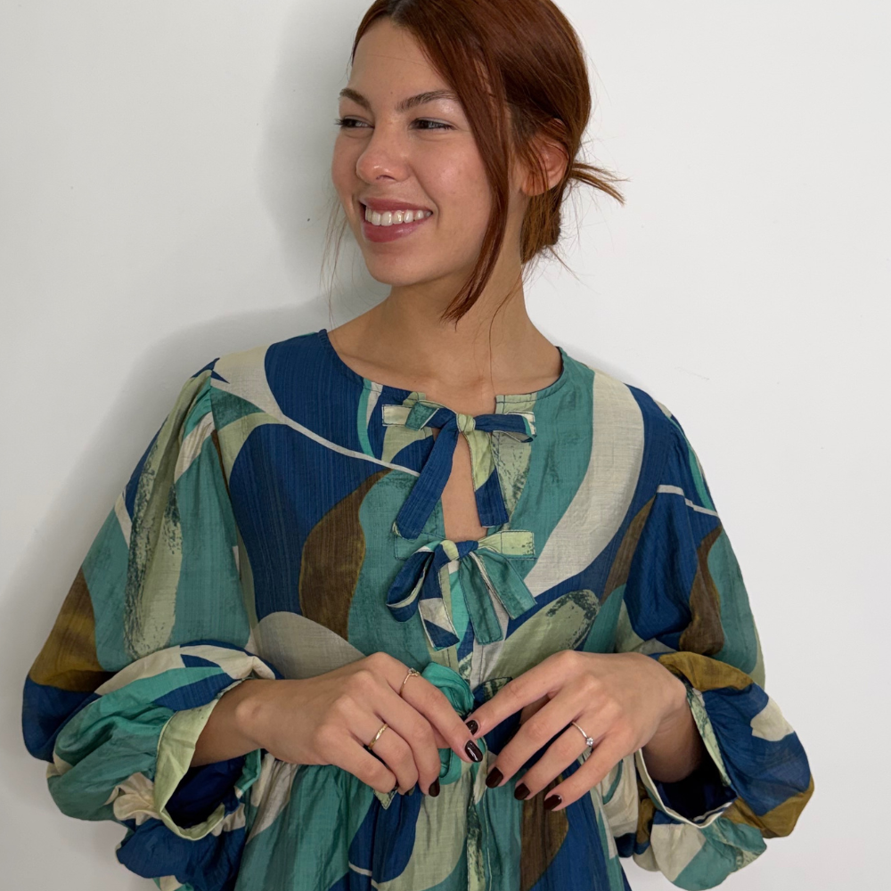 3/4 balloon sleeves abstract print peplum top with front bow tie detail