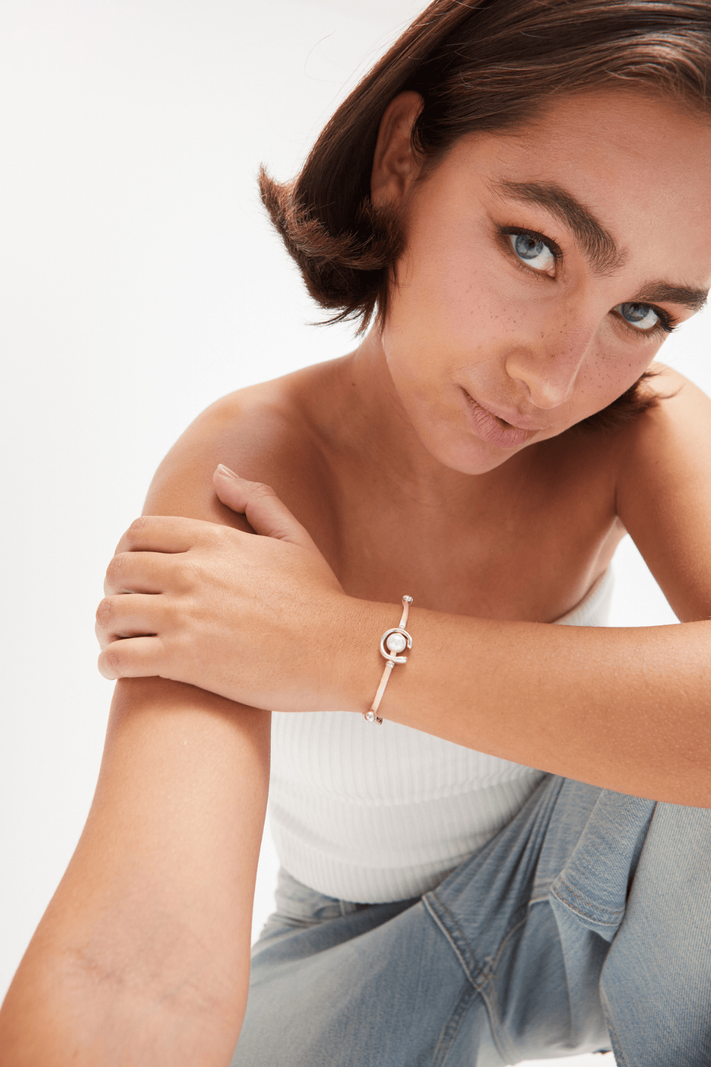 UNOde50 Bracelet Salmon cord bracelet with a pearl