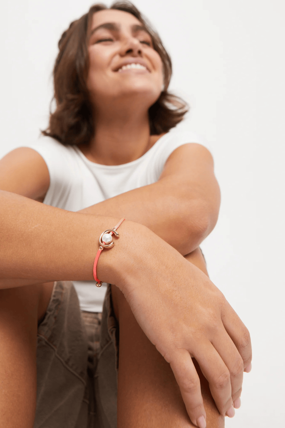 UNOde50 Bracelet Fuchsia cord bracelet with a pearl