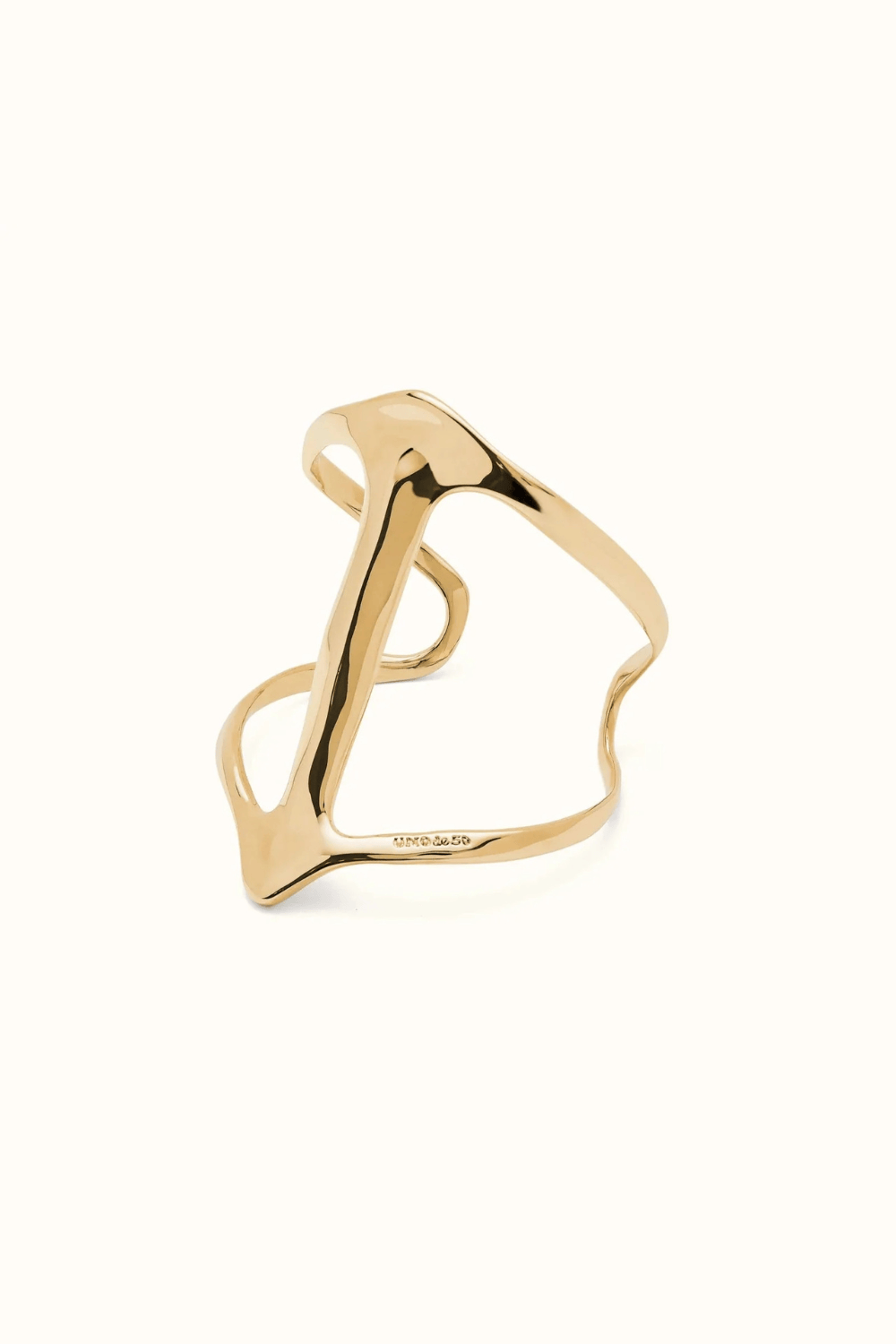 UNOde50 Bracelet Rigid 18K gold-plated bracelet with manta ray structure and topaz