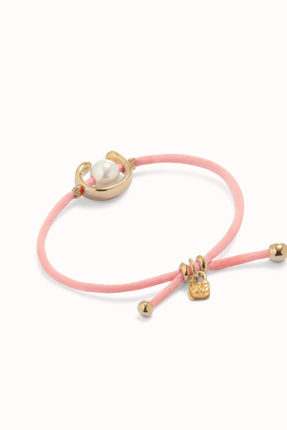 UNOde50 Bracelet Fuchsia cord bracelet with a pearl