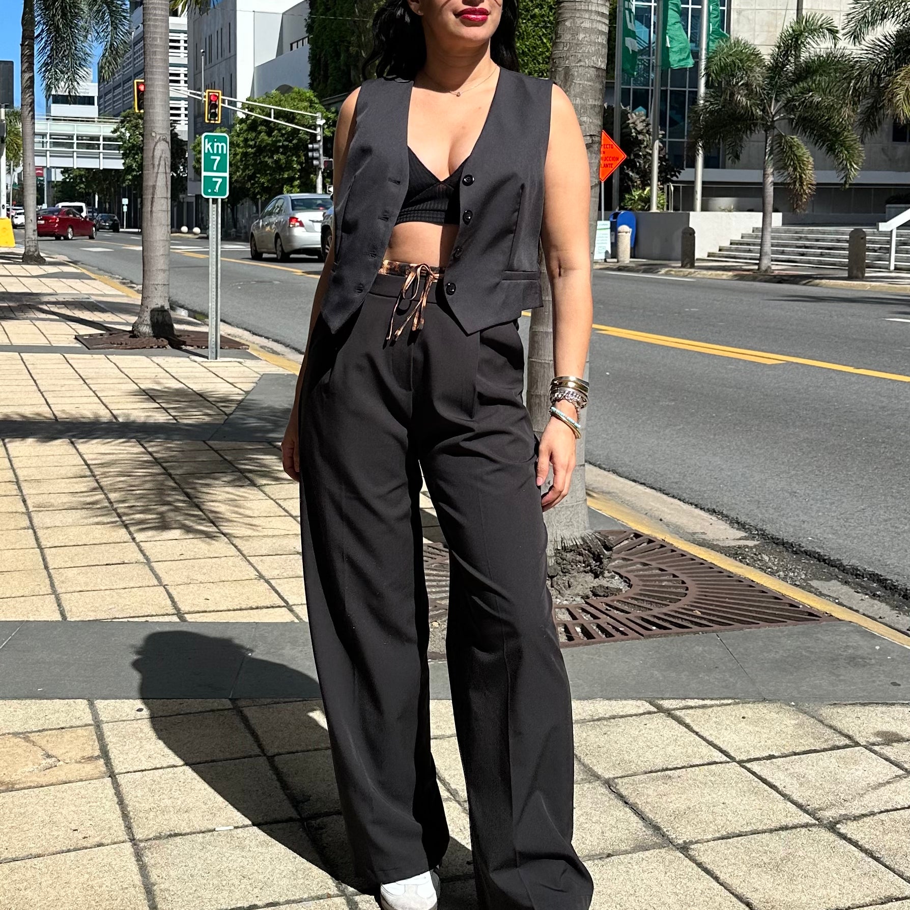 Long pleated trousers with leopard detail at the waist