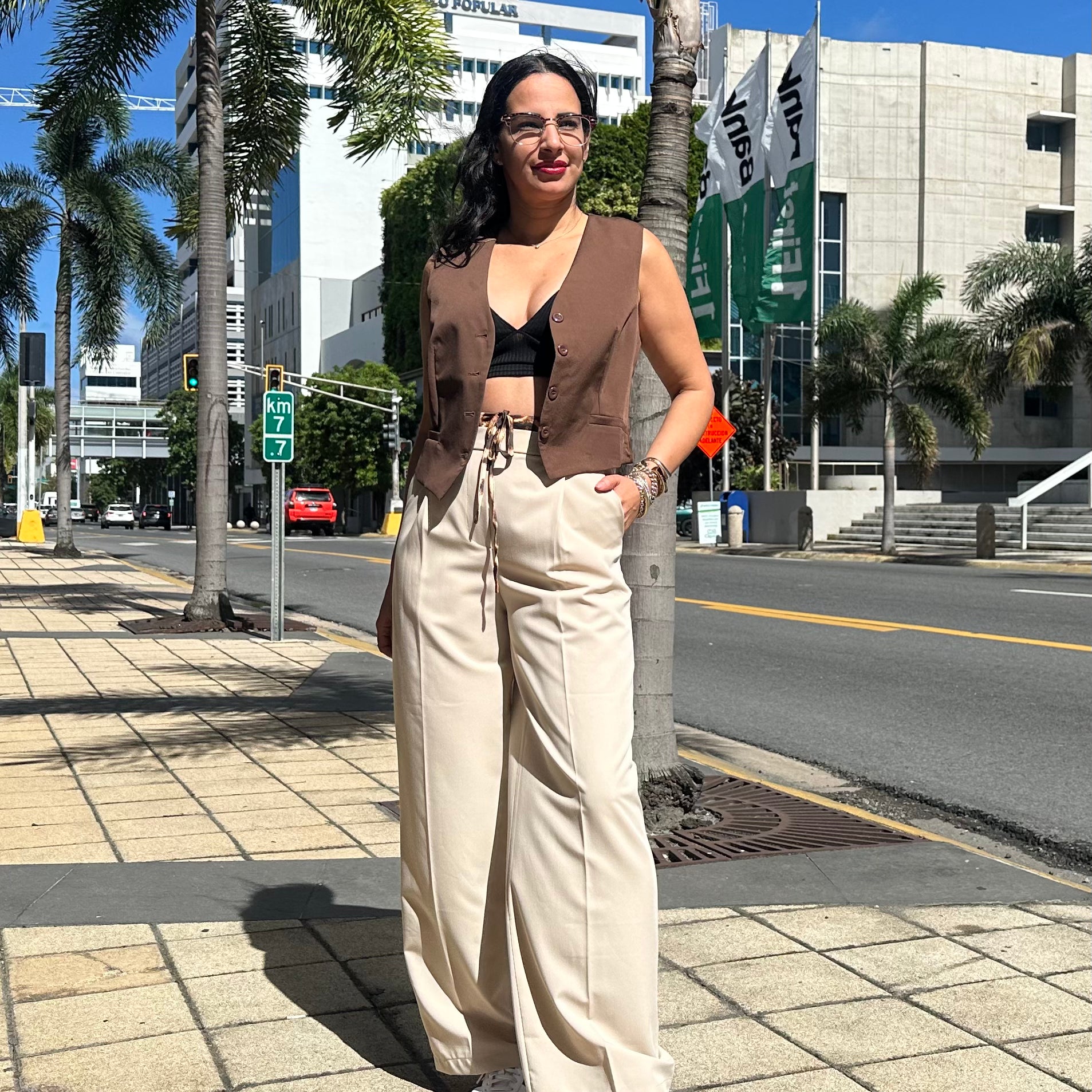 Long pleated trousers with leopard detail at the waist