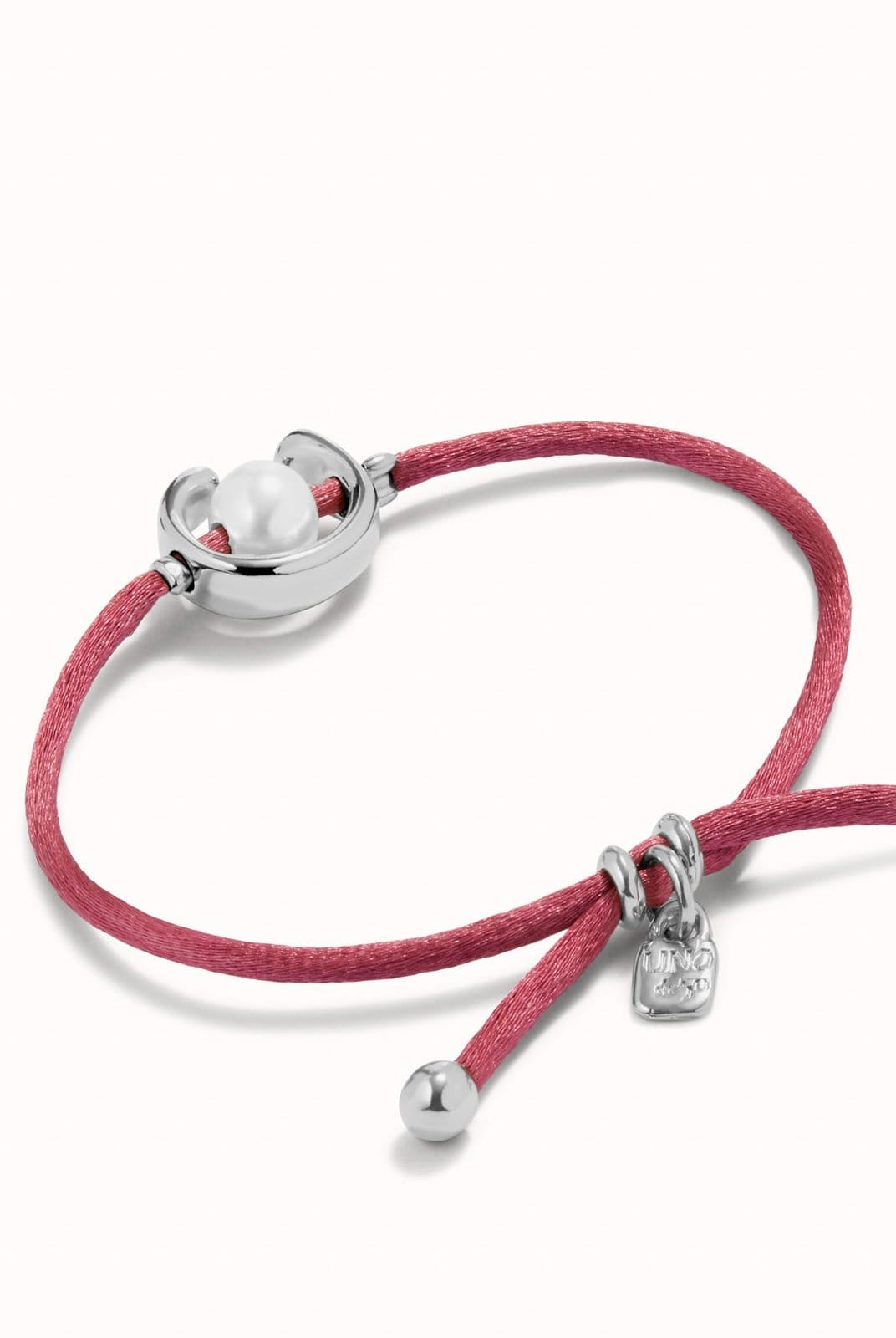 UNOde50 Bracelet Sterling silver-plated mauve thread bracelet with shell pearl accessory.